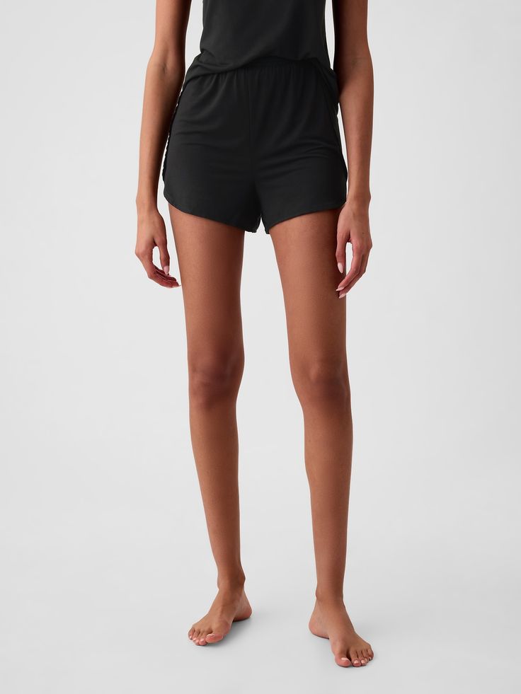 Soft modal-blend pajama shorts.  Elasticized waist.  Flutter hem.  * Fit: Relaxed.  An easy silhouette throughout.  Hits above the knee.  Models wearing Gap Comfortable Sleepwear With Built-in Shorts For Summer, Lounging Bottoms With Built-in Shorts, Spring Sleepwear With Built-in Shorts, Lounging Sleepwear With Built-in Shorts, Summer Bottoms With Elastic Waistband For Relaxation, Seamless Short Pajama Shorts For Loungewear, Seamless Pajama Shorts For Loungewear, Solid Color Bottoms With Built-in Shorts For Lounging, Solid Bottoms With Built-in Shorts For Lounging