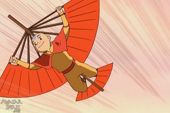 a man flying through the air on top of a red parasol with two hands