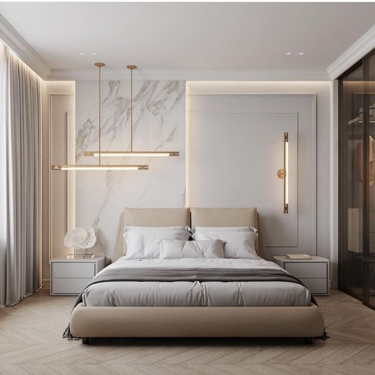 a modern bedroom with marble walls and flooring