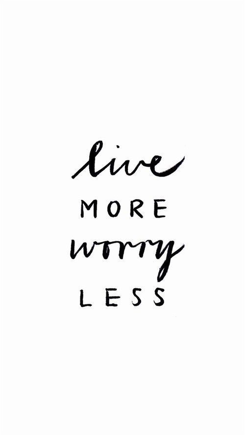 the words live more worry less written in black ink on a white background with a handwritten