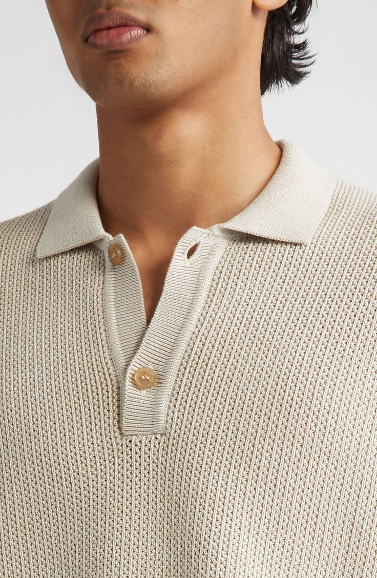 The renowned British label has perfected the polo with this Egyptian-cotton version knit with a subtle two-color design that gives it texture and depth. 25 1/2" length (size Medium) Button half placket Spread collar Short sleeves 100% cotton Dry clean or machine wash, dry flat Made in Portugal Designer Clothing Sweater Polos, Mens Inspo, Knitwear Details, Polo Knit, Knit Structure, Knitted Polo, Knit Polo, Egyptian Cotton, Textured Knit