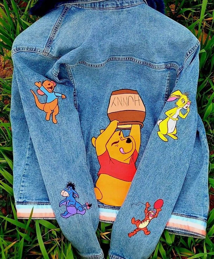 winnie the pooh denim jacket with patches on it