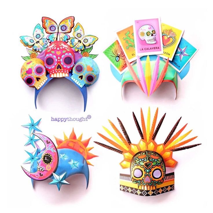 four different types of paper masks with designs on them