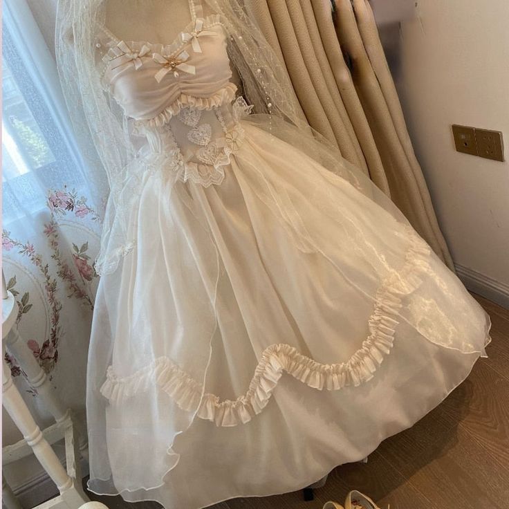 Brand Name: HnewlyType: Lolita DressesOrigin: Mainland ChinaCN: HunanSleeve Length(cm): SleevelessMaterial: PolyesterGender: WOMENSpecial Use: CostumesProduction location: Party Wedding DressProduct performance: Suspender Jsk DressScope of use: Elegant Trailing Dressesdress quality: excellent[23y 3m 15d] Summer Costume Party Dress With Doll Collar, Summer Doll Collar Dress For Costume Party, Doll Collar Dress For Summer Costume Party, White Mini Fairy Dress For Spring, White Mini Fairy Dress With Ruffles, White Mini Length Fairy Dress With Ruffles, White Ruffled Mini Fairy Dress, Vintage Dress With Doll Collar For Spring Party, Spring Vintage Dress With Doll Collar For Parties