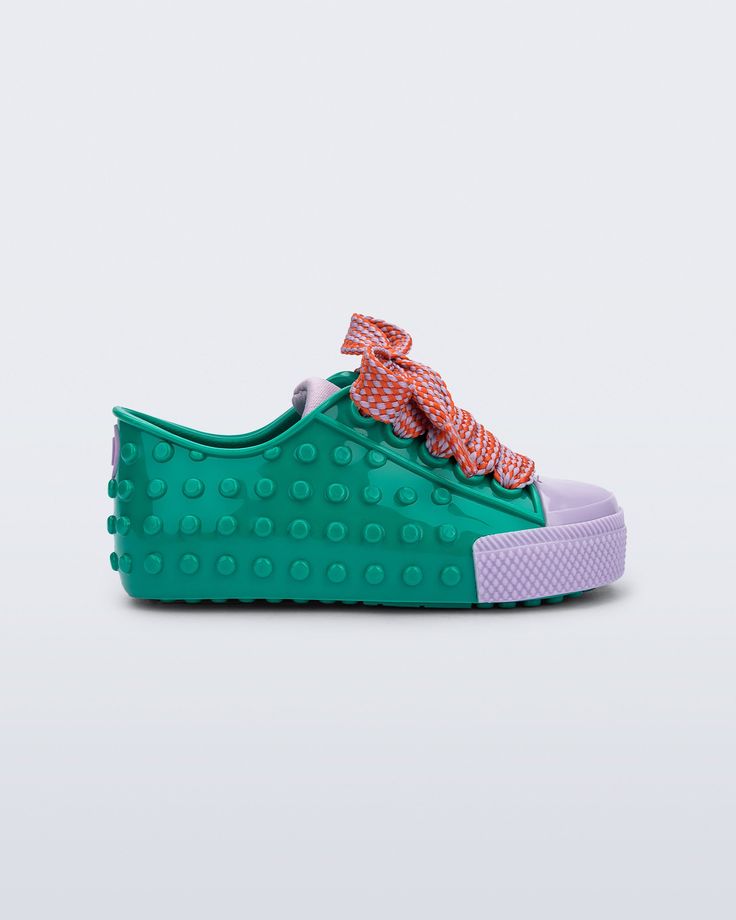 Side view of an green and purple Polibolha baby sneaker with multicolor laces. Trendy Non-slip Lace-up Sneakers, Playful Non-slip Synthetic Sneakers, Playful Sneakers With Rubber Sole And Synthetic Material, Playful Synthetic Sneakers With Rubber Sole, Synthetic Round Toe Sneakers For Playtime, Lace-up Synthetic Sneakers For Playtime, Trendy Multicolor Non-slip Sneakers, Casual Synthetic Sneakers For Playtime, Playful Multicolor Spring Sneakers