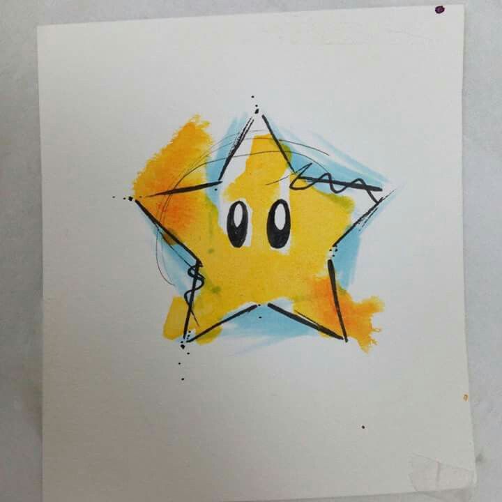 a drawing of a yellow star with two eyes and one eye drawn on it's side