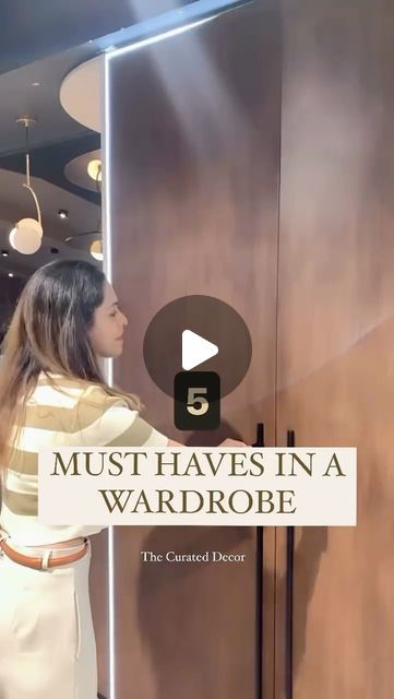 a woman standing in front of a door with the words must haves in a wardrobe