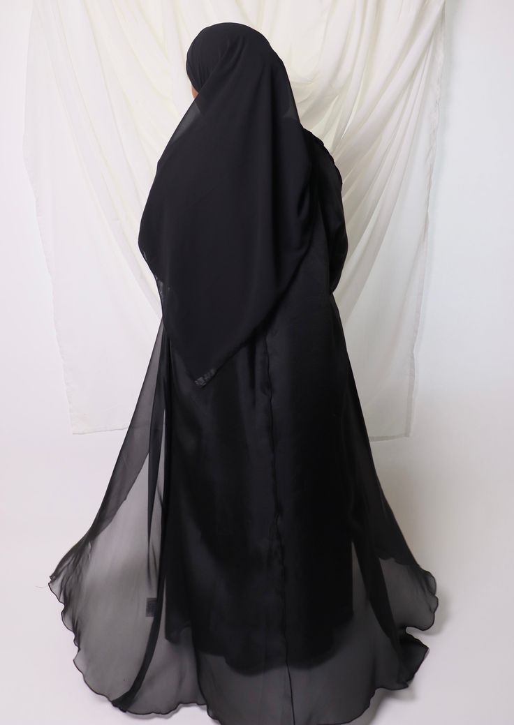 LEYLAH abaya set comes with ⁃ Long-sleeved chiffon maxi dress ⁃ Abaya in organza with seamed bodice ⁃ Chiffong hijab that is 70x170cm Color: Black Modest Wedding Niqab For Eid, Long Georgette Abaya For Eid, Eid Long Georgette Abaya, Elegant Long Sleeve Wedding Niqab, Modest Style Khimar For Wedding And Eid, Elegant Black Abaya With Modesty Panel, Eid Chiffon Maxi Abaya, Modest Chiffon Hijab For Eid, Elegant Long Niqab For Eid