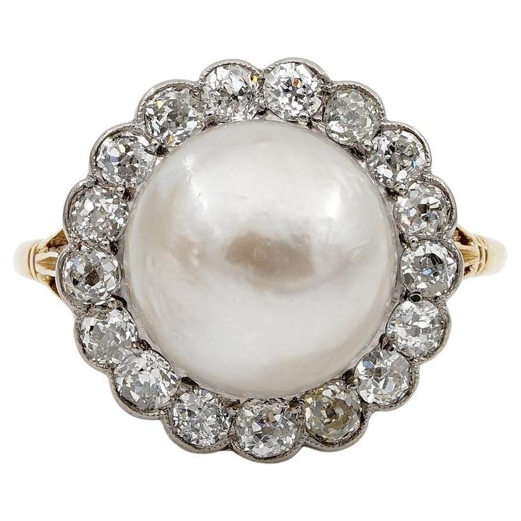 The Queen of Seas Prized for millennia, pearls are organic gems with strong associations with the Moon, great value, and weddings Emblem of Purity, rewarded in history by Kings and Queens Rare and extremely fine is this pure Edwardian ring, 1900/09 ca Boasting magnificent crafting of the period to prize and exalt the beauty of the colossal 12 mm. in size Natural Salt water Sea 3/4 split Pearl set as centre gem Everlasting elegance is expressed in the design, mounting is skilfully made by the pas Edwardian Engagement Ring, Edwardian Ring, Contemporary Engagement Rings, Pearl Engagement Ring, Platinum Diamond Engagement Rings, Art Deco Engagement, Silver Tops, Platinum Engagement Rings, Deco Engagement Ring