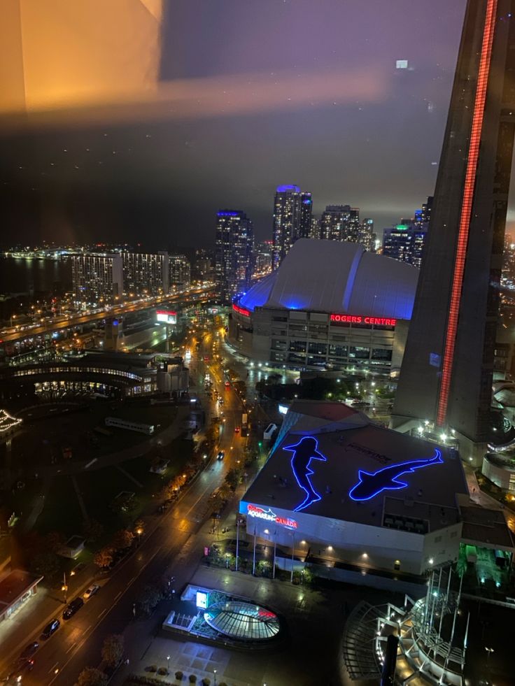 an aerial view of a city at night