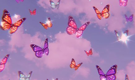 there are many butterflies flying in the sky with bright lights on their wings and some clouds behind them