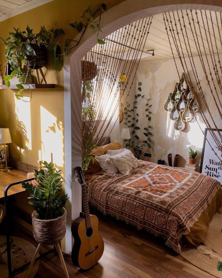 a bed room with a neatly made bed and lots of plants