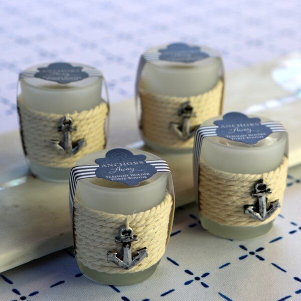 three jars with rope wrapped around them are sitting on a table next to an envelope