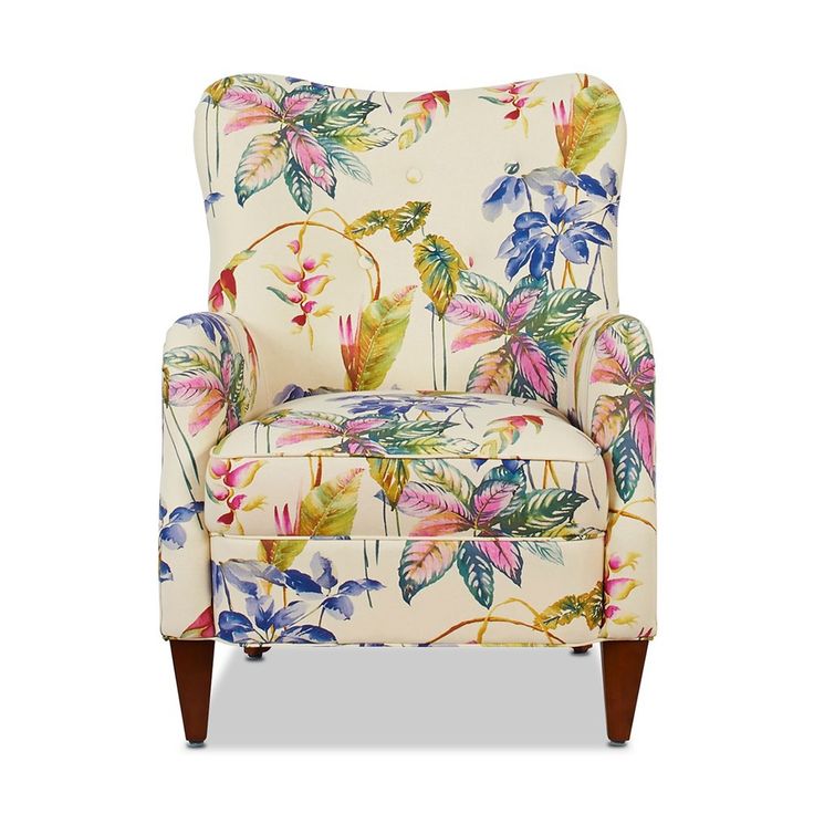 an upholstered chair with colorful flowers on it