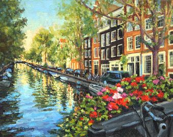 a painting of a canal with flowers in the foreground and buildings on either side