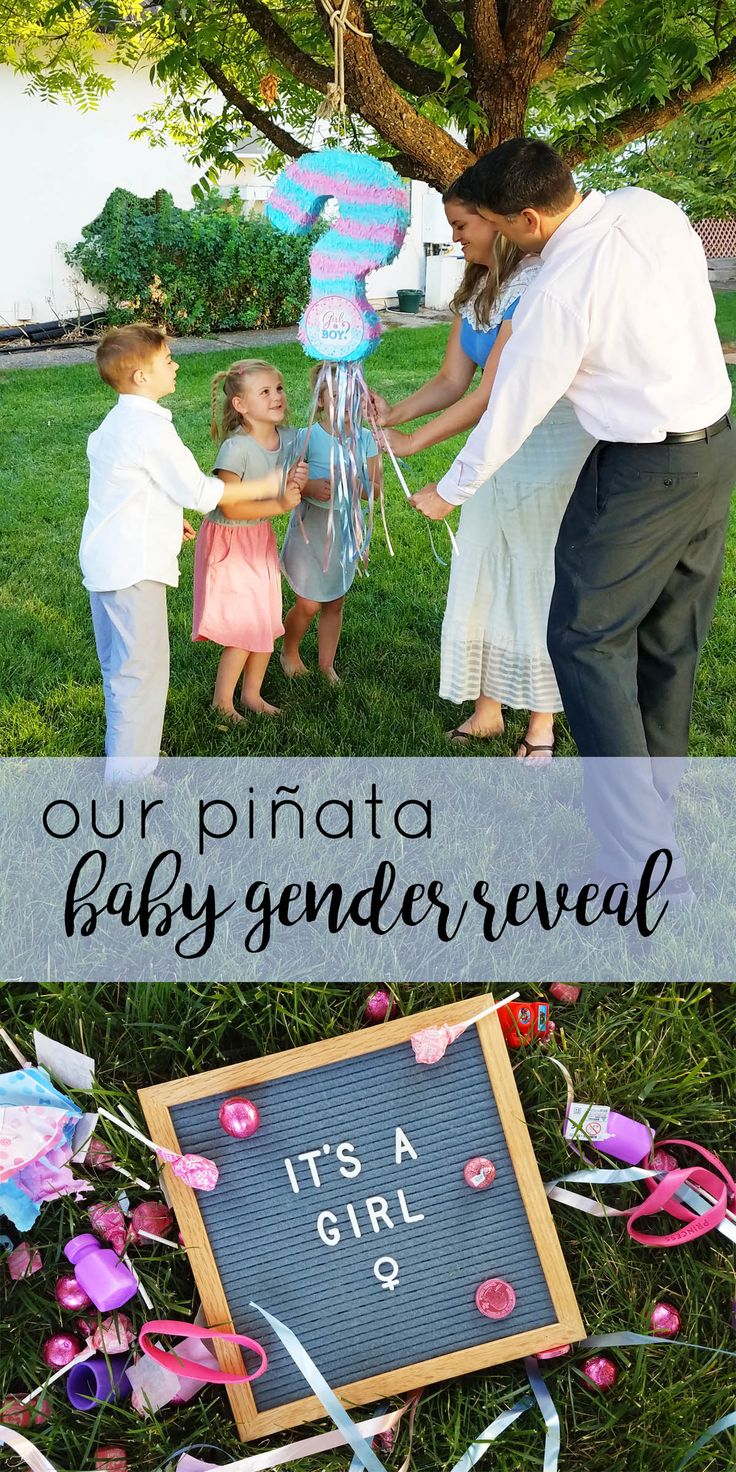 a baby gender reveal with balloons and streamers in the grass, while two children are holding