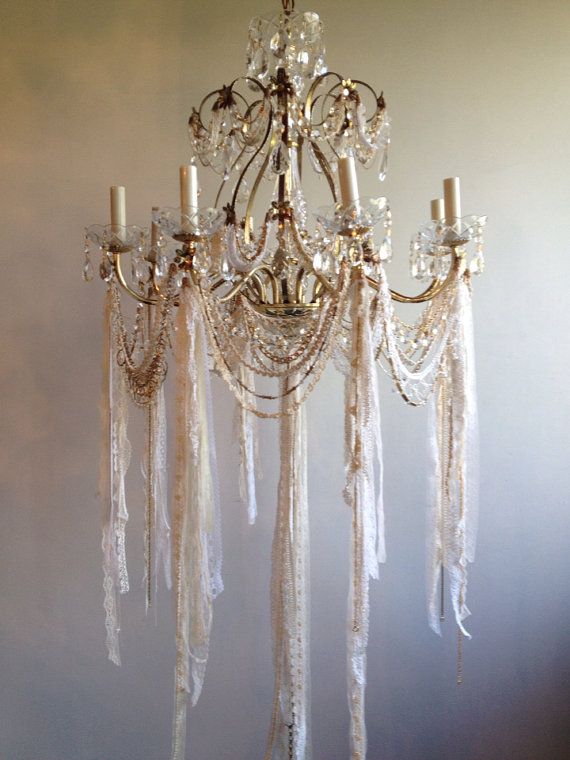 a chandelier is shown on an instagramt for the fashionistas