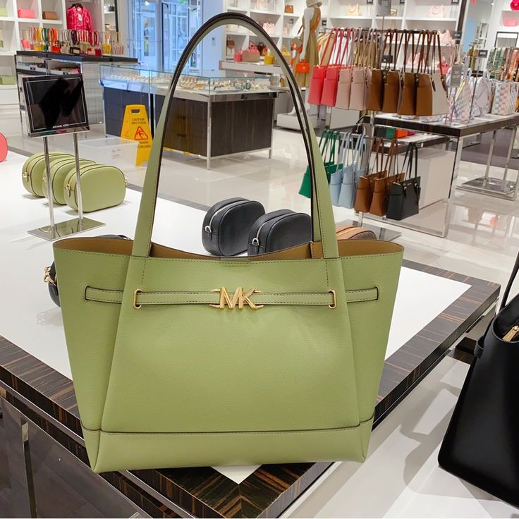 Brand New With Tag , 100% Authentic 100% Leather 16.5”W X 10.75”H X 7”D Handle Drop: 11.5” Interior Details: Back Zip Pocket, Front Slip Pocket Lining: 100% Polyester Snap Fastening Green Leather Shoulder Bag With Branded Hardware, Michael Kors Pebbled Leather Shoulder Bag For Travel, Chic Green Michael Kors Bag, Michael Kors Pebbled Leather Bag For Everyday Use, Classic Green Michael Kors Bag, Chic Green Michael Kors Shoulder Bag, Green Office Bag With Branded Hardware, Michael Kors Pebbled Leather Shoulder Bag, Green Leather Bag With Branded Hardware