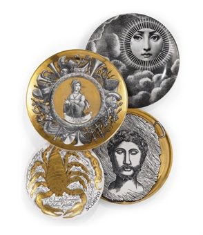 four different types of buttons with pictures on the front and back of them, all in gold, silver, and black