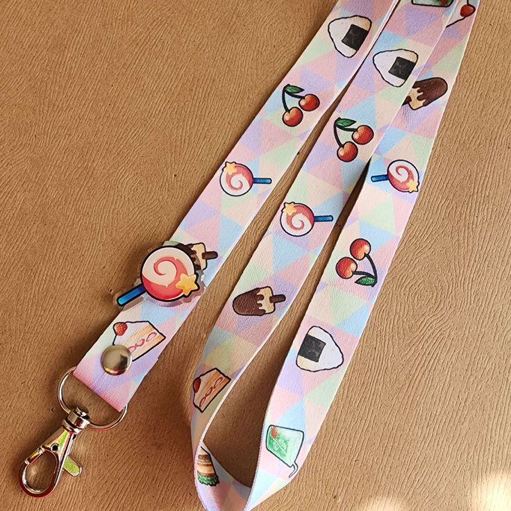 The food in the Kirby series has always looked so cute and delicious!🍭 🍰This lanyard is 2cm wide by 90cm long with a silver lobster clasp and repeating pattern on both sides.   🥪All orders are sent via USPS with tracking after payment has been processed! >Get in Touch with us!< ❥ general info: scarysu.carrd.co/ ❥ art and photos: instagram.com/scarysu.art ❥ twitter hellscape: twitter.com/scarysuart Kirby Food, Cute Lanyard, Cute Lanyards, Art Twitter, Wrist Lanyard, Acrylic Pins, Gifts For My Sister, Badge Holders Lanyard, Repeating Patterns