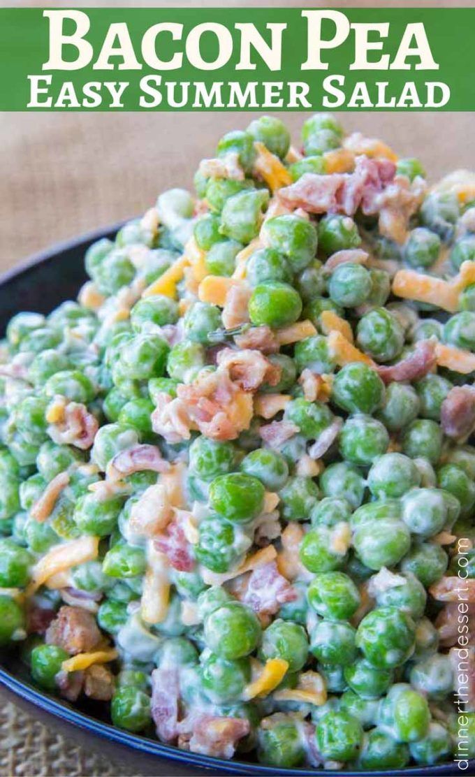 bacon pea salad in a black bowl on top of a table