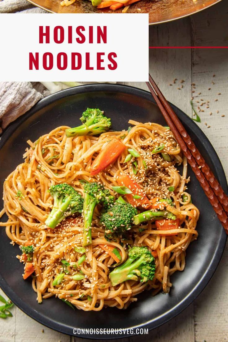 two plates with noodles, broccoli and carrots on them next to chopsticks