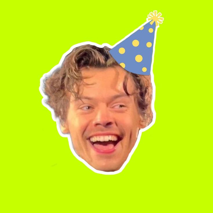 a man with a party hat on is making a funny face while wearing a birthday hat