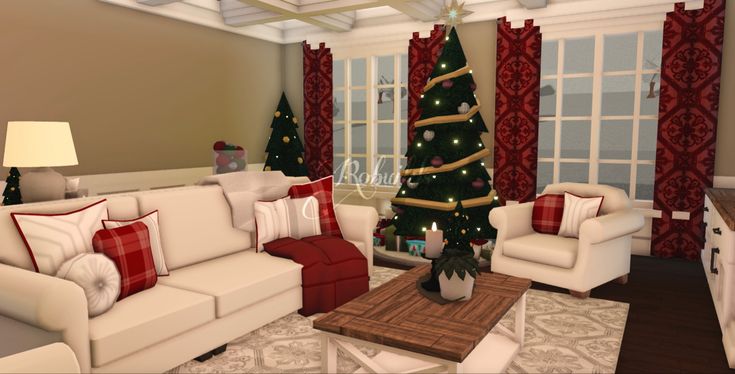 a living room filled with white furniture and a christmas tree in the corner next to it