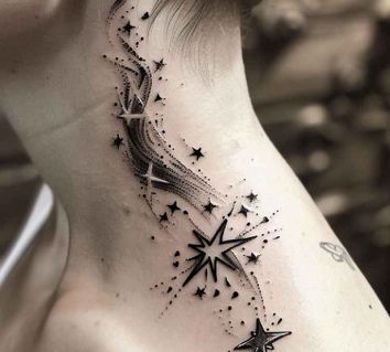 a woman's neck with stars on it