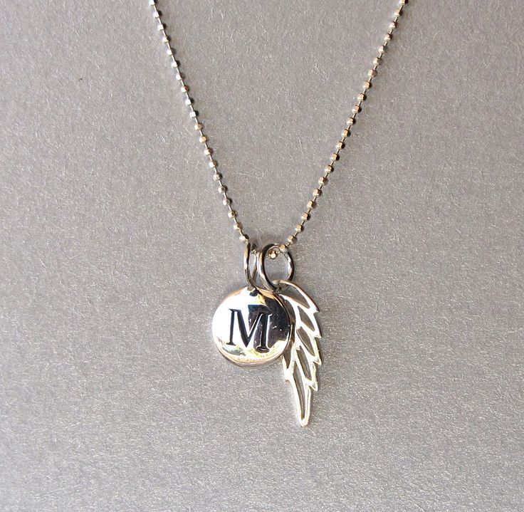 "our initial charm necklace is the perfect personalized gift for your loved one. MATERIAL * sterling silver engraved disk and silver metal chain DETAILS * length: 16\" or 18\" * initial (mm): 12 x 8 diameter * wing (mm): 15 x 6 * chain: sterling silver diamond-cut ball chain or cable chain * closure: sterling silver spring ring * item comes in a gift box OPTIONS * add an initial: $13.00 * add a birthstone: $6.00, https://www.etsy.com/listing/179762296/add-on-crystal-birthstone-charm?ref=shop_hom Angel Pendant, Gold Initial, Birthstone Charms, Silver Spring, Initial Charm, Ball Chain, Silver Diamonds, Cute Jewelry, Metal Chain