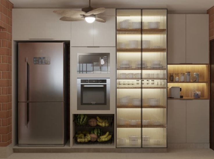 a modern kitchen with stainless steel appliances and brick walls