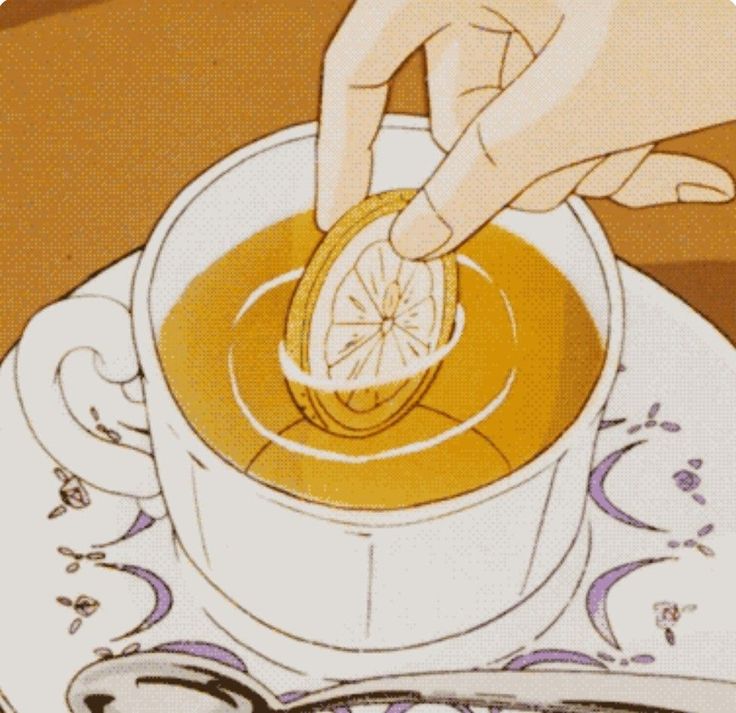 a person is dipping something into a cup