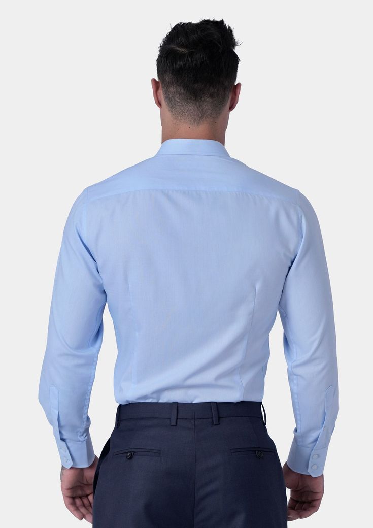 Freshen up your closet with this pale blue broadcloth shirt. Supreme style and quality with a 100% Egyptian cotton blend. Light Blue Slim Fit Top For Business Casual, Light Blue Cotton Shirt For Work, Light Blue Cotton Business Top, Light Blue Slim Fit Shirt For Office, Light Blue Slim Fit Shirt For Business Casual, Light Blue Slim Fit Dress Shirt With Spread Collar, Light Blue Slim Fit Shirt For Semi-formal Occasions, Light Blue Spread Collar Top For Business, Classic Light Wash Shirt For Workwear