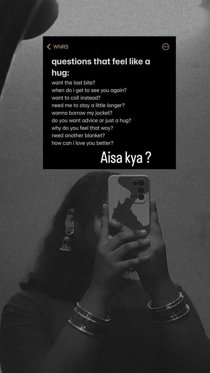 a woman taking a selfie in front of a mirror with the caption'questions that feel like a hug '