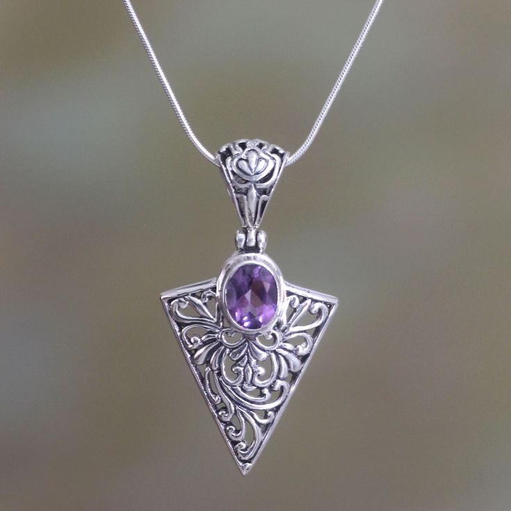 From Kadek Wijanegara, this beautiful necklace of Balinese artistry depicts love's arrow. The handcrafted necklace showcases lacy textures in sterling silver, while a 1-carat amethyst adds color. .925 Sterling silver Amethyst Pendant Necklace, Amethyst Necklace Pendant, International Jewelry, Handcrafted Necklace, Amethyst Pendant, Sterling Silver Necklace Pendants, Balinese, Simple Jewelry, Silver Pendant Necklace