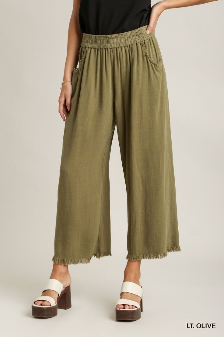 introducing our breezy bliss linen pants, where effortless style meets ultimate comfort for all your summer adventures! these pants feature a trendy elastic waistband and wide-leg silhouette, offering a relaxed yet chic look that's perfect for any occasion. crafted from a luxurious blend of linen and cotton, they provide breathability and softness, ensuring you stay cool and comfortable all day long. complete with convenient side pockets and frayed hem bottoms for a touch of laid-back charm, the Chic Linen Wide Leg Lounge Pants, Beach Linen Harem Pants With Pockets, Beach Harem Pants With Pockets In Linen, Spring Relaxed Wide Leg Harem Pants, Relaxed Wide-leg Harem Pants For Summer, Relaxed Summer Wide Leg Harem Pants, Relaxed Linen Wide Leg Pants For Day Out, Bohemian Wide Leg Loungewear Pants With Pockets, Bohemian Wide Leg Lounge Pants With Pockets