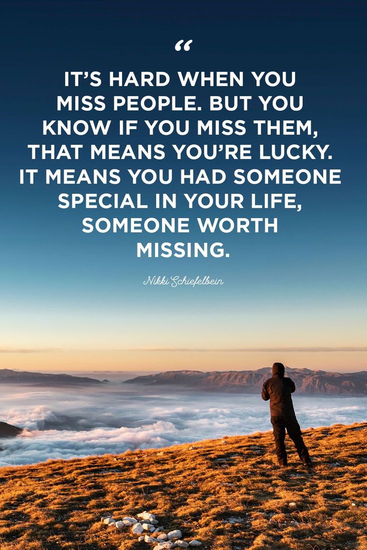 a person standing on top of a hill with a quote above it that says, it's hard when you miss people