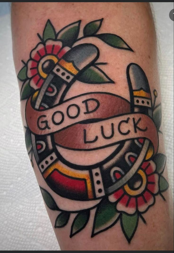 a tattoo with the words good luck on it