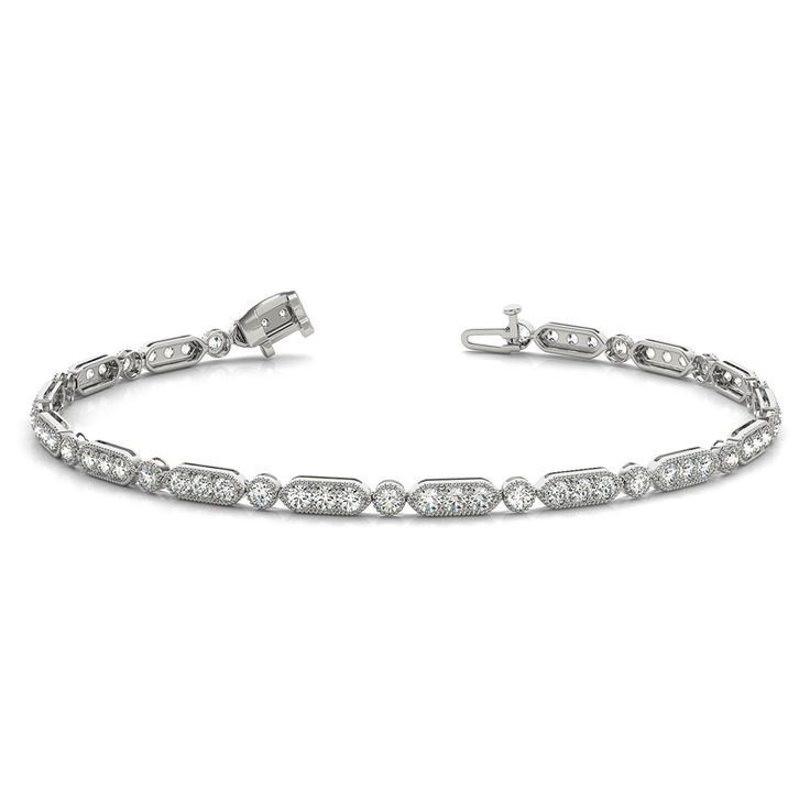 The Tennis pave diamond bracelet presents a dainty design created by arranging the finest of round cut diamonds. An alternate sequence of triple diamonds and a single diamond in bezel setting looks appealing when rimmed by milgrain borders. The thin round diamond bracelet embalms series of perfectly cut round diamond of 0.64 carat total weight, SI2 clarity and G color gripped firmly in bezel and prong setting. Total number of diamonds – 64.  The petite pave set round diamond bracelet can also be acquired in a wide variation of rich metals. Professionals of medical field, lawyers, government employees, military men and university staffs can gain a discount of 5% at purchase of any jewelry. (Refer to discounted jewelry page)  Using lifetime diamond upgrade scheme, you can rep Round Diamond Bracelet, Filigree Bracelet, Bracelet Tennis, Diamond Tennis Bracelet, Tennis Bracelet Diamond, Best Diamond, Bezel Diamond, Tennis Bracelet, Bracelet Patterns