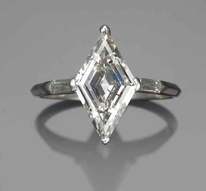 A diamond ring centering a lozenge-shaped diamond, weighing approximately: 1.00 carat; mounted in platinum; Lozenge Engagement Ring, Lozenge Diamond, Sparkly Things, Dream Engagement Rings, Bling Rings, Put A Ring On It, Vintage Diamond, All That Glitters, Vintage Jewellery