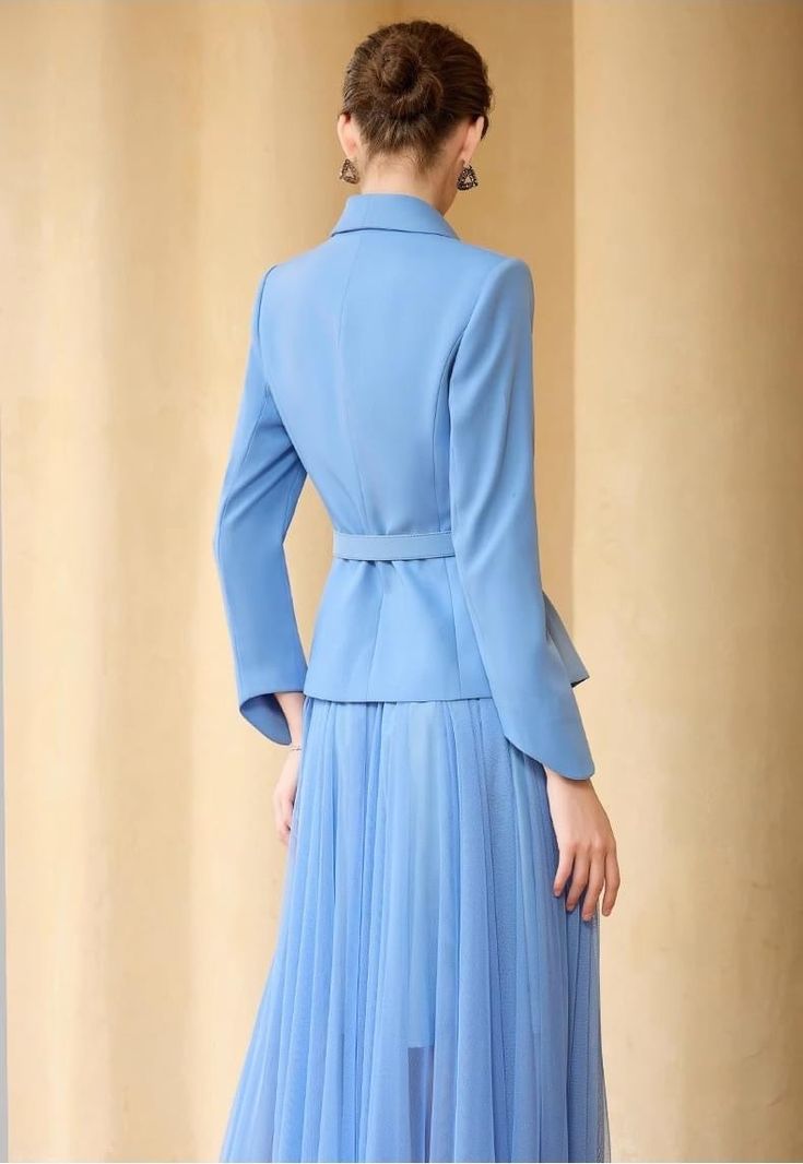 Say hello to that look of yesteryear with this Sky Blue Pleated Skirt Suit! Graceful and timeless, it features a full skirt, perfect for twirling and showing off your best dancing moves. Plus, you won't have to wait long to add it to your wardrobe - buy now and start showing off that sophisticated '50s style! Peak lapels; double-breasted V-neck, Long sleeves; button cuffs. Structured shoulders. Full pleated skirt with high waist Belted POLYESTER 100% Imported Brand - Aision Model: 233004 Elegant Blue A-line Skirt, Tailored Blue Skirt Suit In Chic Style, Elegant Blue Skirt For Office, Elegant Blue Wedding Skirt, Blue Formal Skirt For Spring, Spring Formal Pleated Skirt Suit, Spring Pleated Skirt Suit For Formal Occasions, Elegant Fitted Blue Skirt, Blue Fitted Skirt For Formal Occasions