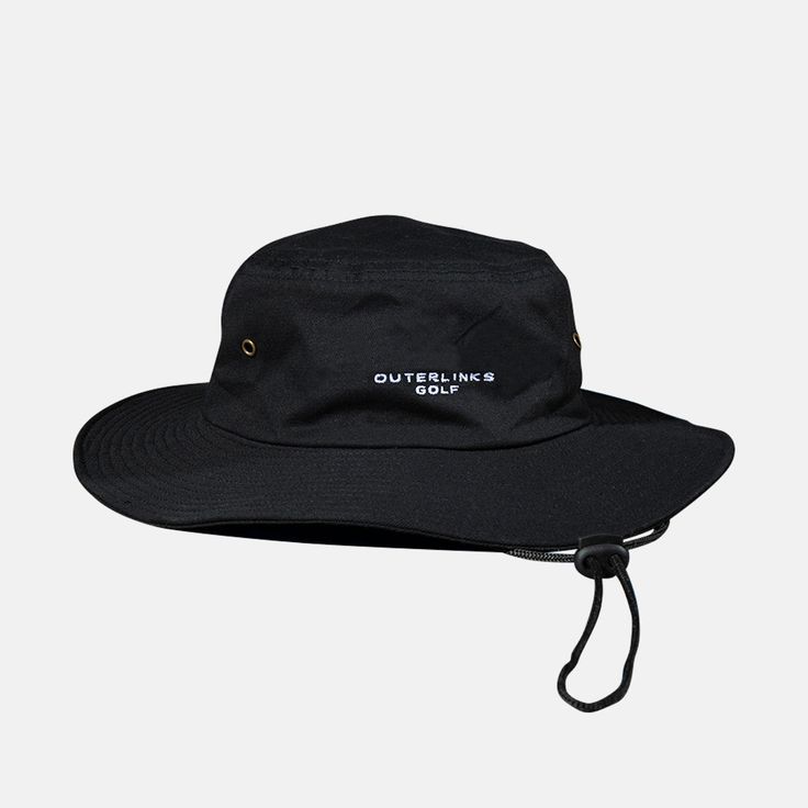 The Outer Links Boonie Hat will remind you that any day spent on the golf course is better than anywhere else, even if the elements outside are hot, windy or rainy - this hat has you covered. Protect yourself from the harmful UV Rays with this must wear hat. OSFM. Oversized brim bucket hat with pull drawstring for those windy days One size fits most Structured to fight the elements NOTE: There is a secret message featured on this hat Casual Windproof Bucket Hat For Outdoor, Casual Windproof Bucket Hat For Camping, Windproof Curved Brim Hat For Outdoor, Windproof Brimmed Hat For Travel, Windproof Brimmed Travel Hat, Windproof Wide Brim Hat For Travel, Windproof Wide Brim Bucket Hat For Travel, Wide Brim Windproof Hat For Travel, Wide Brim Windproof Bucket Hat For Travel