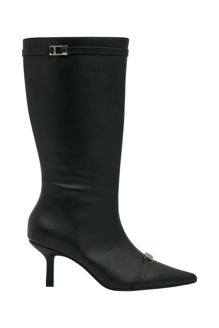 Stylish strides. The ASTRA Faux Leather Buckle Boot is a stylish statement piece that combines edgy design with sophisticated details. Featuring a pointed toe and a sleek 7cm heel, this knee-length boot offers a modern, elongated silhouette. The buckle and strap detailing at the toe and calf add a distinctive, fashion-forward touch, making the Astra Boot a versatile choice for both day and evening wear. Crafted from faux leather, it provides a chic, cruelty-free option for your footwear collecti Buckle Boot, Edgy Design, Knee Length Boots, Buckle Boots, Leather Buckle, Evening Wear, Black Boots, Cruelty Free, Latest Fashion Trends