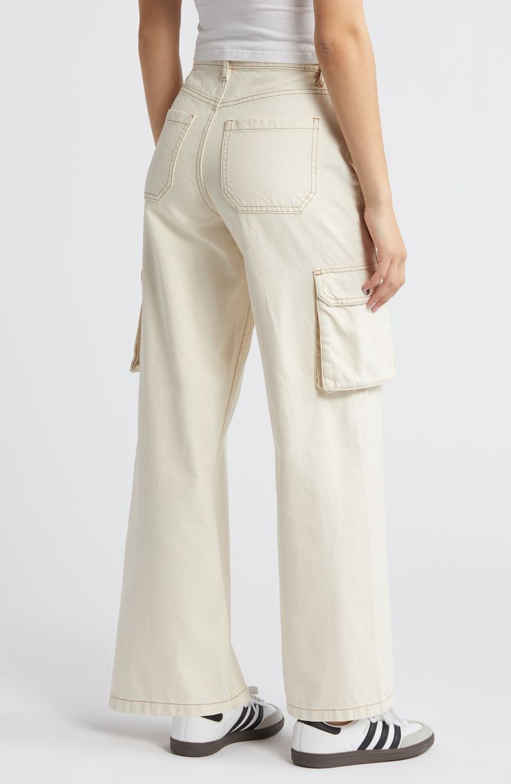 Contrast stitching adds to the vintage vibe of these high-rise, full-length wide-leg pants equipped with trend-right cargo pockets. 31 1/2" inseam, 24" leg opening; 12" front rise; 14" back rise (size 29) Zip fly with button closure Five-pocket style; cargo bellows pockets 100% cotton Machine wash, tumble dry Imported Spring Utility Cargo Pants Full Length, Relaxed Fit Utility Wide Leg Pants With Pockets, Utility Style High-waisted Wide Leg Pants With Multiple Pockets, High Rise Utility Wide Leg Pants For Fall, Fall Utility High Rise Wide Leg Pants, Casual High-rise Wide Leg Pants With Patch Pockets, Casual High Rise Wide Leg Pants With Patch Pockets, High Rise Cargo Pants For Spring, High-rise Cargo Pants With Pockets For Spring