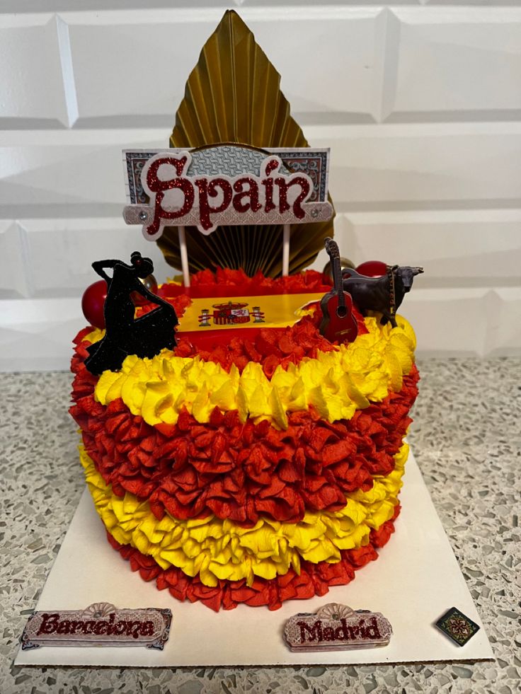 a cake made to look like the flag of spain