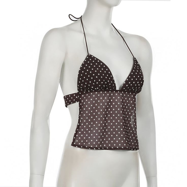 Unleash your flirty side with the Willa Polka-Dot Backless Top from Alees Fashion. This two piece top comes with a stylish scarf and features a sleeveless V-neck design with a playful lace-up back. Perfect for any fun and fashionable occasion. Details Willa Polka-Dot Backless Top in Brown Sleeveless V-Neck Two piece top, scarf inclueded Lace-up Alees Fashion Shirts & Tops Collection Flirty Halter Neck Crop Top For The Beach, Triangle Top With Built-in Bra For Day Out, Trendy Triangle Top For Party, Chic Triangle Top Tank With Built-in Bra, Fitted Summer Blouse With Built-in Bra, Trendy V-neck Halter Top For Vacation, Chic Triangle Top For Beach, Chic Triangle Top For The Beach, Summer V-neck Halter Top For Night Out