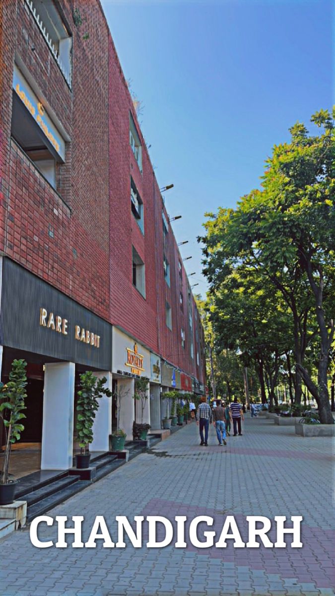 the words chandigarh are in front of a brick building