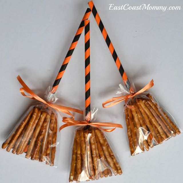 three bags of pretzels tied with orange and black striped ribbon