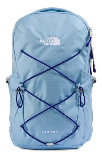 A roomy backpack holds everything you need for your morning commute or weekend adventure, featuring two large zip compartments, a padded laptop sleeve, an internal organization sleeve and an external bungee cord system. Molded straps are designed to fit a woman's proportions, providing all-day carrying comfort. Two-way zip-around closure. Top handle. Adjustable straps; removable sternum strap and hip belt. Mesh side pocket. Fits most 15" laptops. Polyester or nylon/polyester. By The North Face; Jester Backpack, North Face Jester, Lapis Blue, Tablet Sleeve, North Face Backpack, Chiropractic, Laptop Accessories, North Face Women, Steel Blue