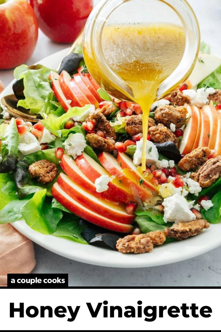 an apple salad is being drizzled with honey and other ingredients to make it